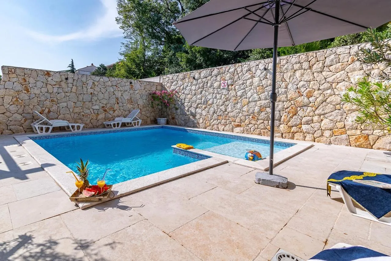 Apartments with a swimming pool Novi Vinodolski - 2419