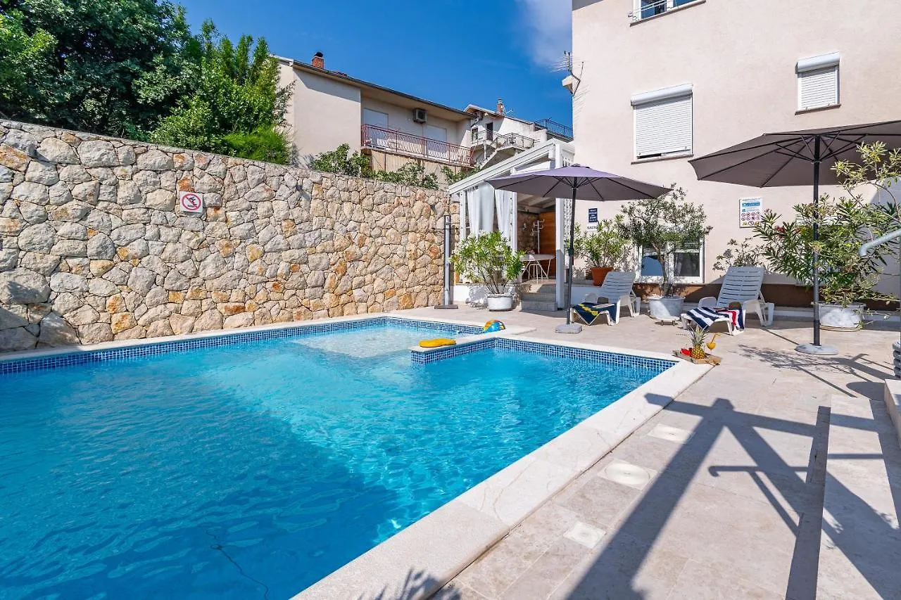 Apartments with a swimming pool Novi Vinodolski - 2419